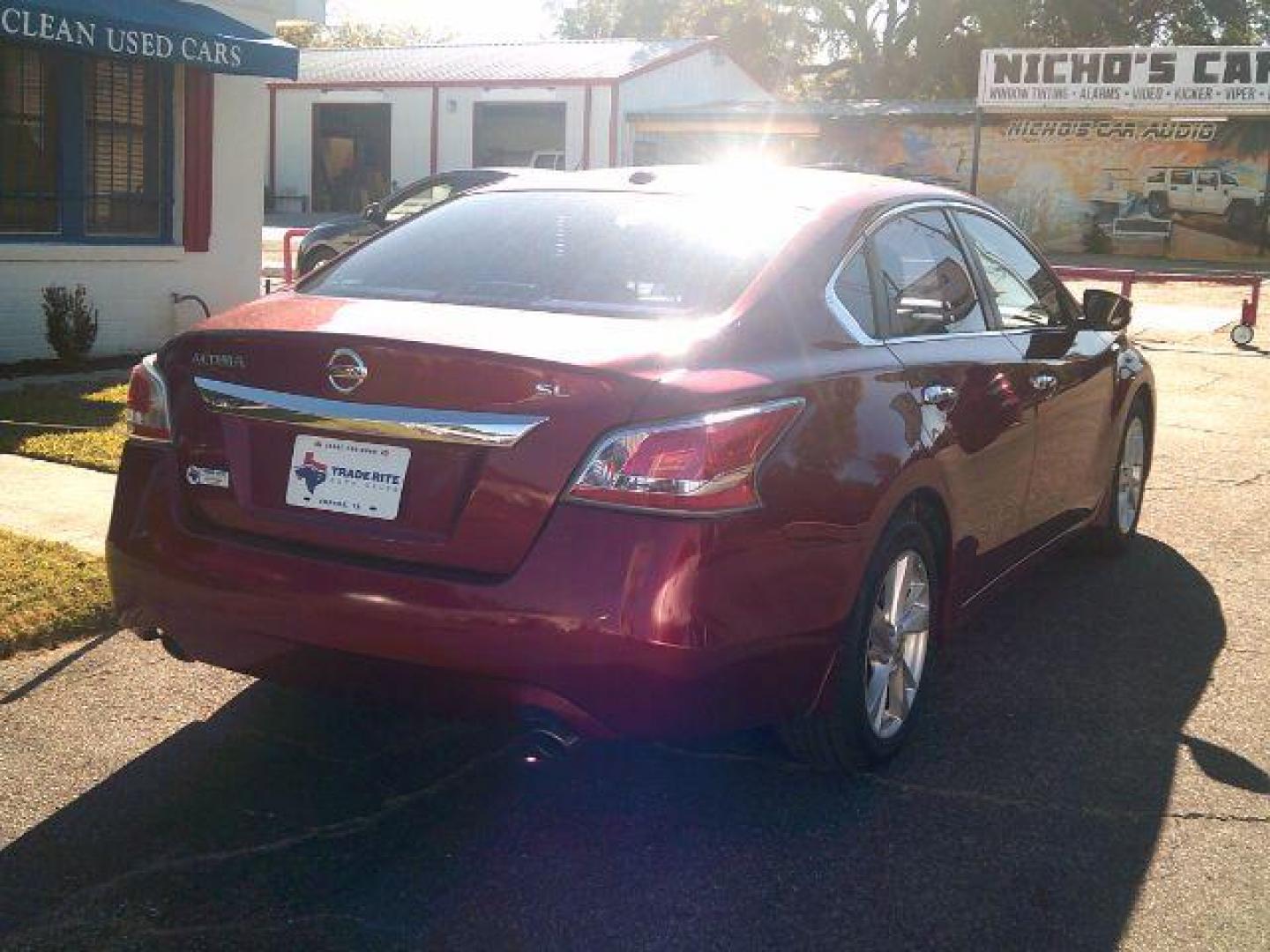2015 Cayenne Red Nissan Altima 2.5 SL (1N4AL3AP9FN) with an 2.5L I-4 DOHC engine, located at 116 N. Frazier Street, Conroe, TX, 77301, (936) 647-0690, 30.308662, -95.460480 - Photo#5