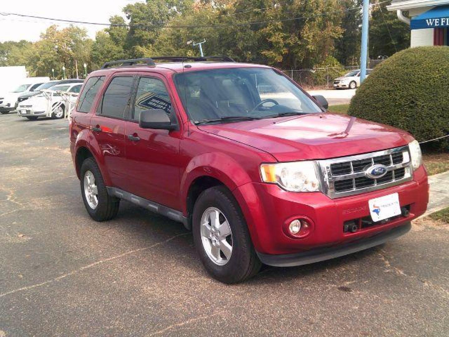2011 Sangria Red Metallic Ford Escape XLT (1FMCU0D73BK) , located at 116 N. Frazier Street, Conroe, TX, 77301, (936) 647-0690, 30.308662, -95.460480 - Photo#1