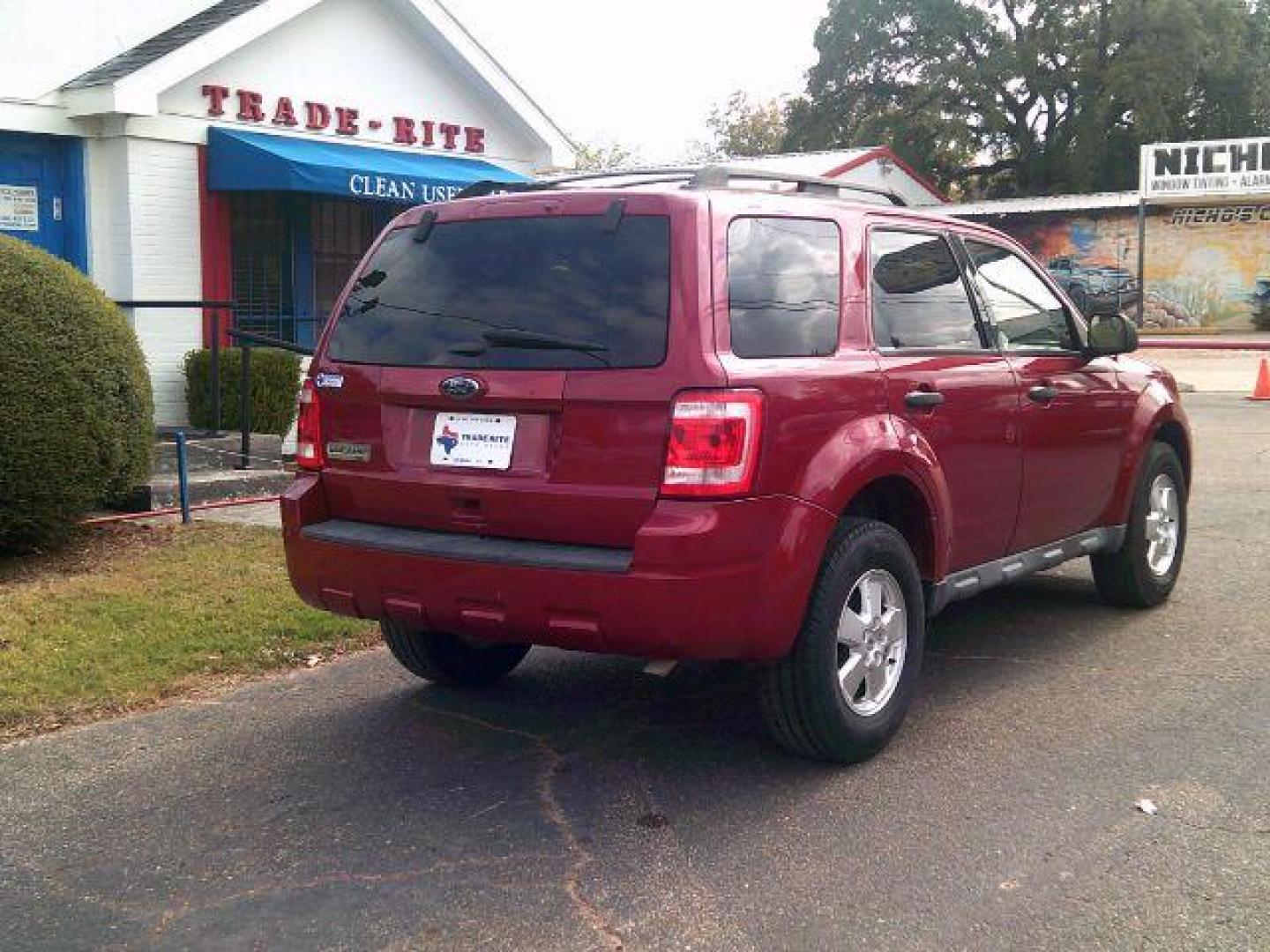 2011 Sangria Red Metallic Ford Escape XLT (1FMCU0D73BK) , located at 116 N. Frazier Street, Conroe, TX, 77301, (936) 647-0690, 30.308662, -95.460480 - Photo#4