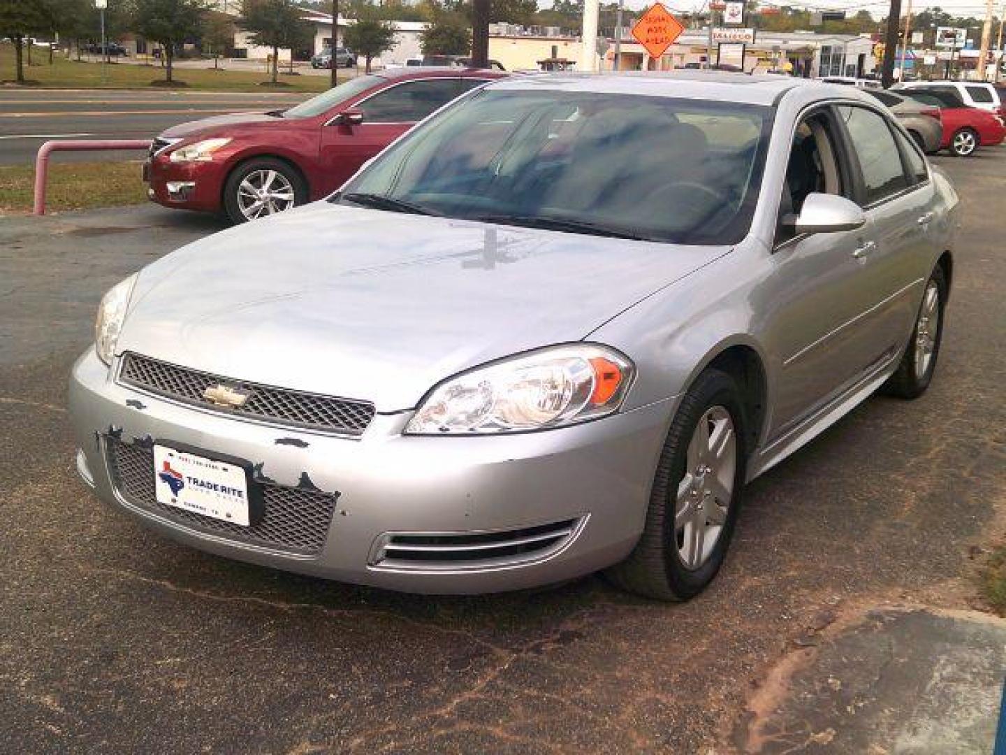 2014 Silver Ice Metallic /Gray Chevrolet Impala Limited LT (2G1WB5E31E1) with an 3.6L V-6 gasoline direct injection engine, located at 116 N. Frazier Street, Conroe, TX, 77301, (936) 647-0690, 30.308662, -95.460480 - Photo#2