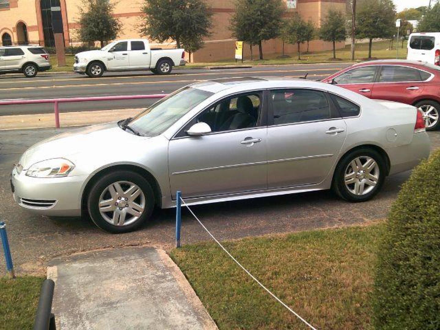 2014 Silver Ice Metallic /Gray Chevrolet Impala Limited LT (2G1WB5E31E1) with an 3.6L V-6 gasoline direct injection engine, located at 116 N. Frazier Street, Conroe, TX, 77301, (936) 647-0690, 30.308662, -95.460480 - Photo#3