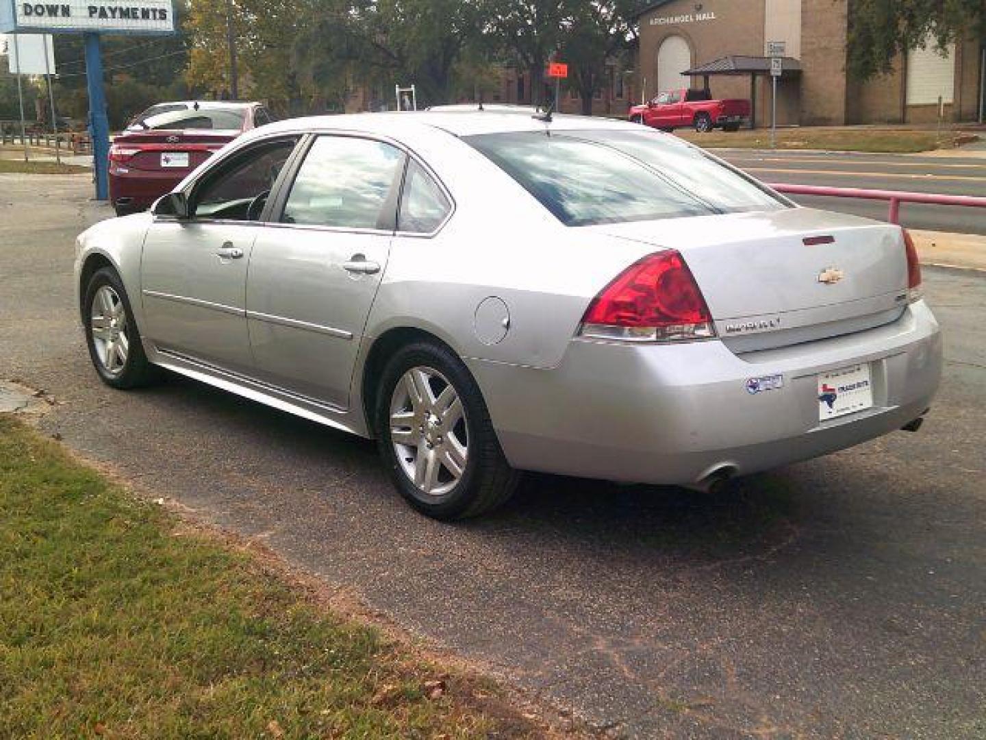 2014 Silver Ice Metallic /Gray Chevrolet Impala Limited LT (2G1WB5E31E1) with an 3.6L V-6 gasoline direct injection engine, located at 116 N. Frazier Street, Conroe, TX, 77301, (936) 647-0690, 30.308662, -95.460480 - Photo#4