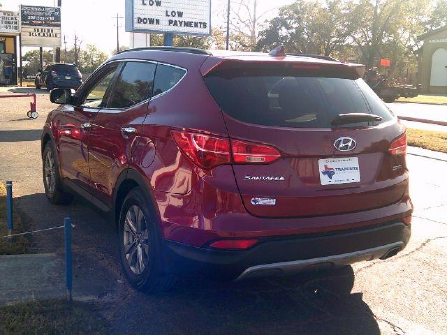 2014 Serrano Red /Beige Hyundai Santa Fe Sport 2.4L (5XYZU3LB9EG) with an Theta II 2.4L I-4 gasoline direct injection engine, 5-Speed Automatic transmission, located at 116 N. Frazier Street, Conroe, TX, 77301, (936) 647-0690, 30.308662, -95.460480 - Photo#3