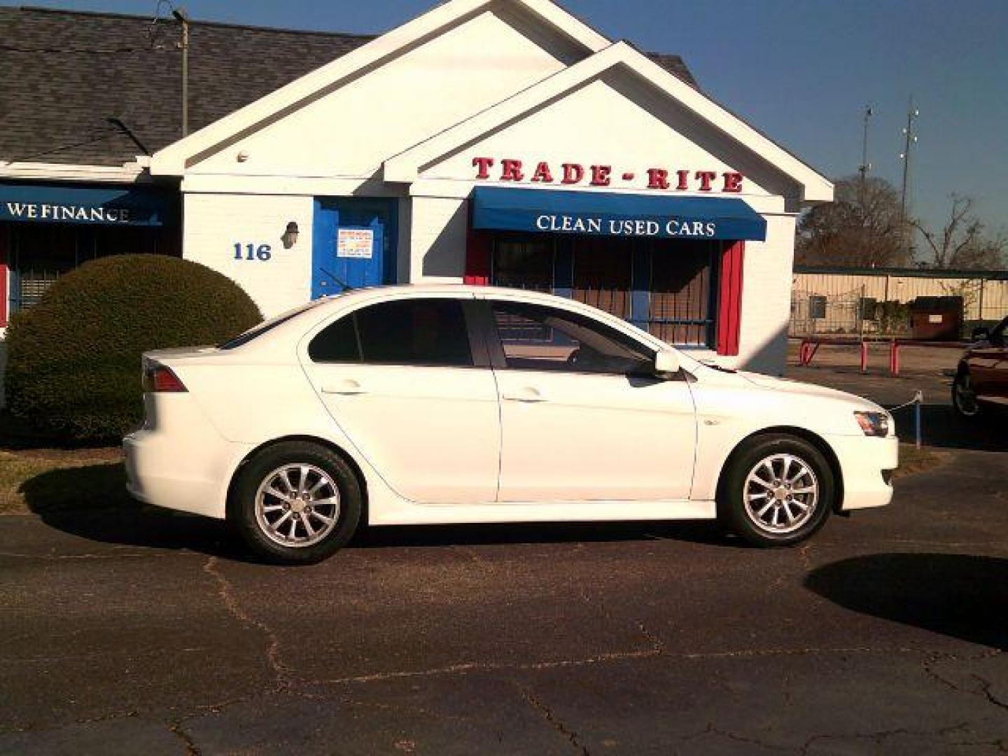 2014 Wicked White Metallic /Black Mitsubishi Lancer ES (JA32U2FUXEU) with an 2L I-4 DOHC engine, 5-Speed Automatic transmission, located at 116 N. Frazier Street, Conroe, TX, 77301, (936) 647-0690, 30.308662, -95.460480 - Photo#0