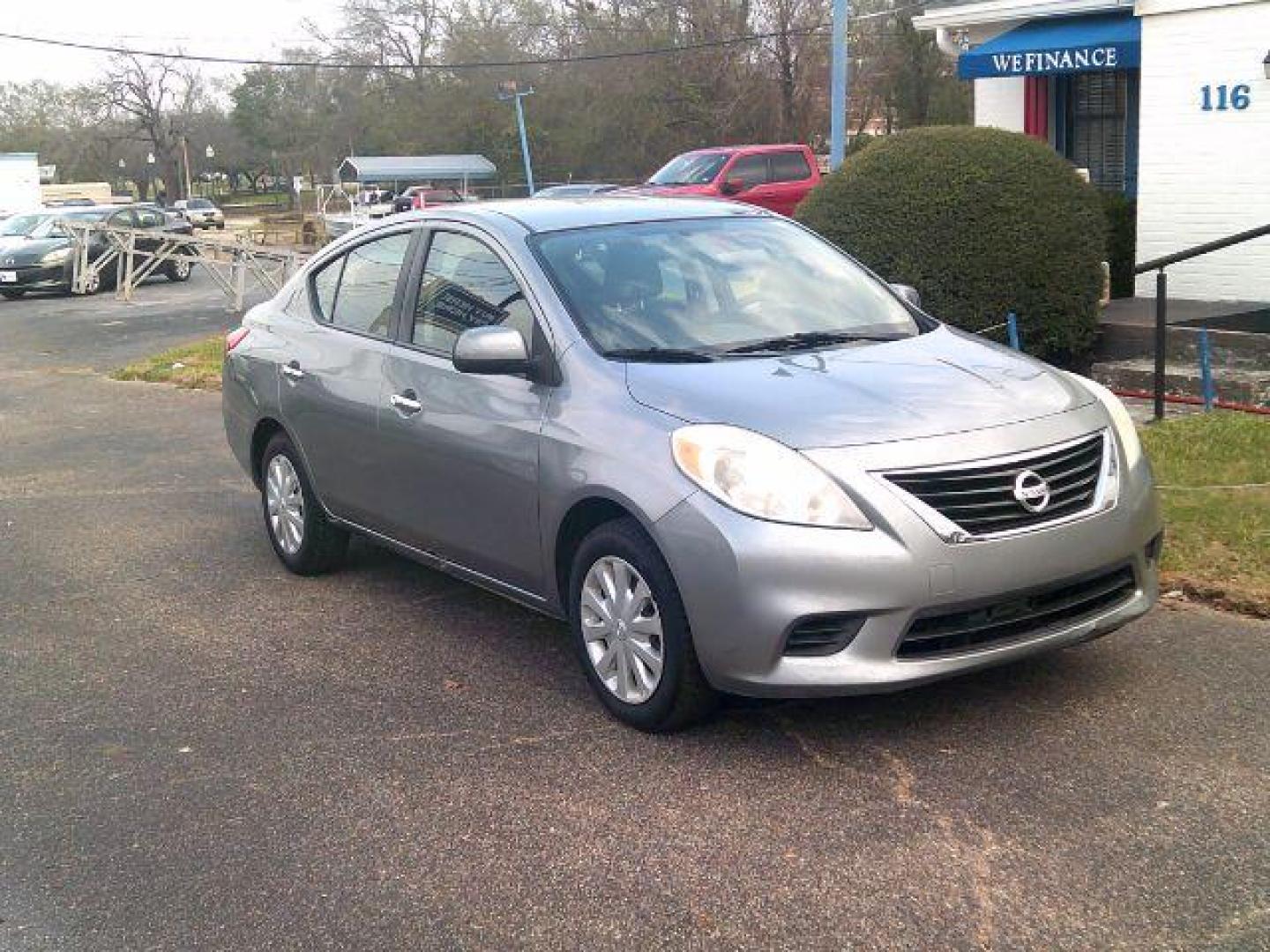 2012 Magnetic Gray Metallic /Charcoal Nissan Versa 1.6 SV (3N1CN7AP6CL) with an 1.6L I-4 DOHC engine, located at 116 N. Frazier Street, Conroe, TX, 77301, (936) 647-0690, 30.308662, -95.460480 - Photo#1