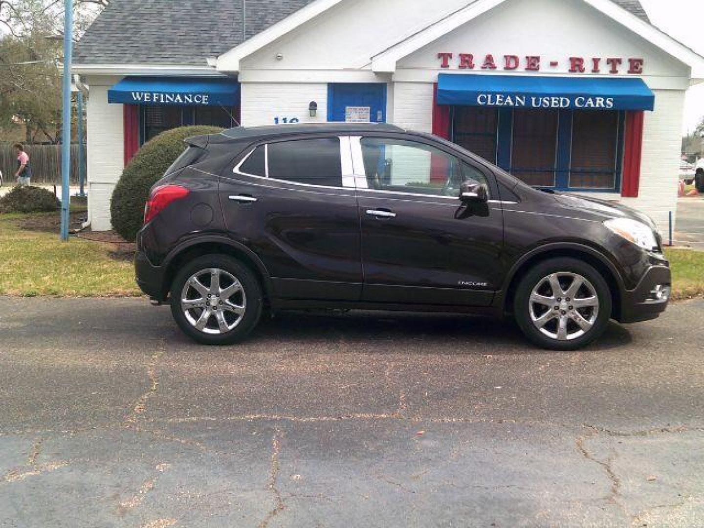 2014 Deep Espresso Brown Metallic /Saddle Buick Encore Leather (KL4CJCSB0EB) with an Ecotec 1.4L I-4 DOHC engine, located at 116 N. Frazier Street, Conroe, TX, 77301, (936) 647-0690, 30.308662, -95.460480 - Photo#0