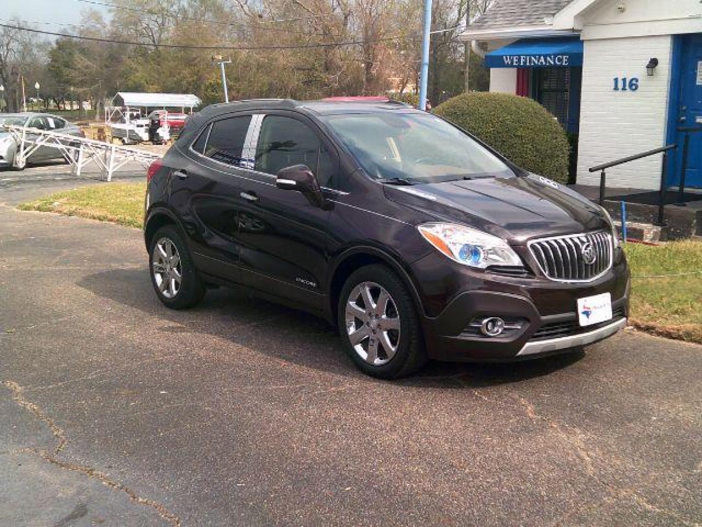 2014 Deep Espresso Brown Metallic /Saddle Buick Encore Leather (KL4CJCSB0EB) with an Ecotec 1.4L I-4 DOHC engine, located at 116 N. Frazier Street, Conroe, TX, 77301, (936) 647-0690, 30.308662, -95.460480 - Photo#1