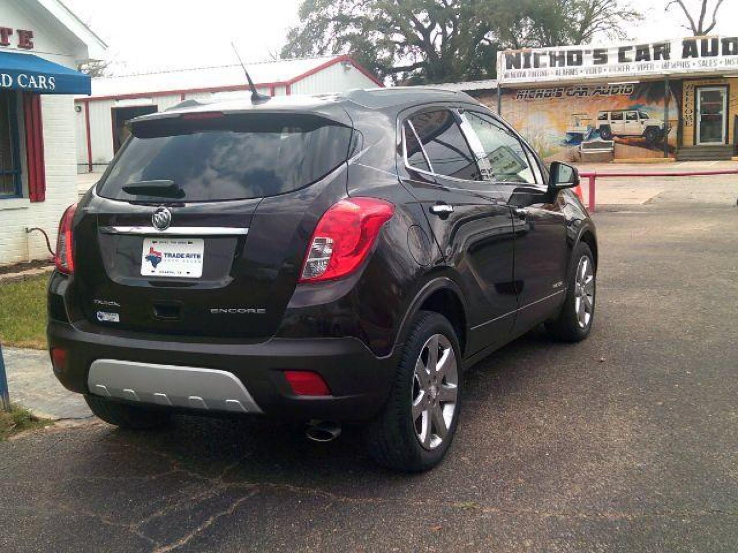 2014 Deep Espresso Brown Metallic /Saddle Buick Encore Leather (KL4CJCSB0EB) with an Ecotec 1.4L I-4 DOHC engine, located at 116 N. Frazier Street, Conroe, TX, 77301, (936) 647-0690, 30.308662, -95.460480 - Photo#5