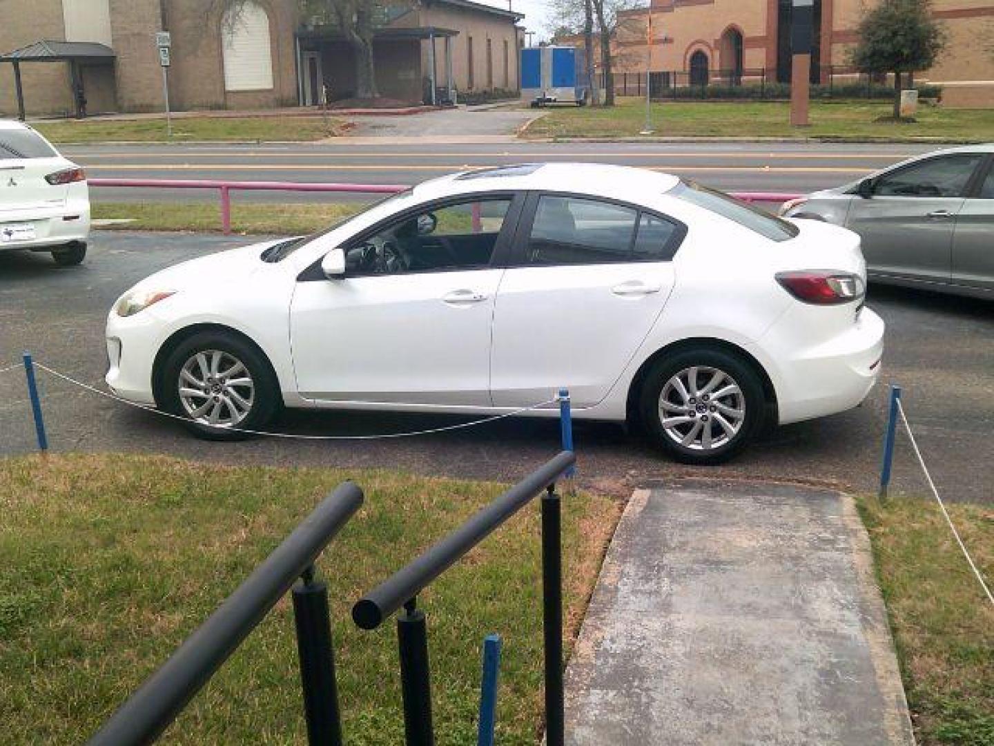 2013 Crystal White Pearl Mica /Dune Mazda Mazda3 i Touring (JM1BL1VP6D1) with an SKYACTIV-G 2L I-4 gasoline direct injection engine, 5-Speed Automatic transmission, located at 116 N. Frazier Street, Conroe, TX, 77301, (936) 647-0690, 30.308662, -95.460480 - Photo#3