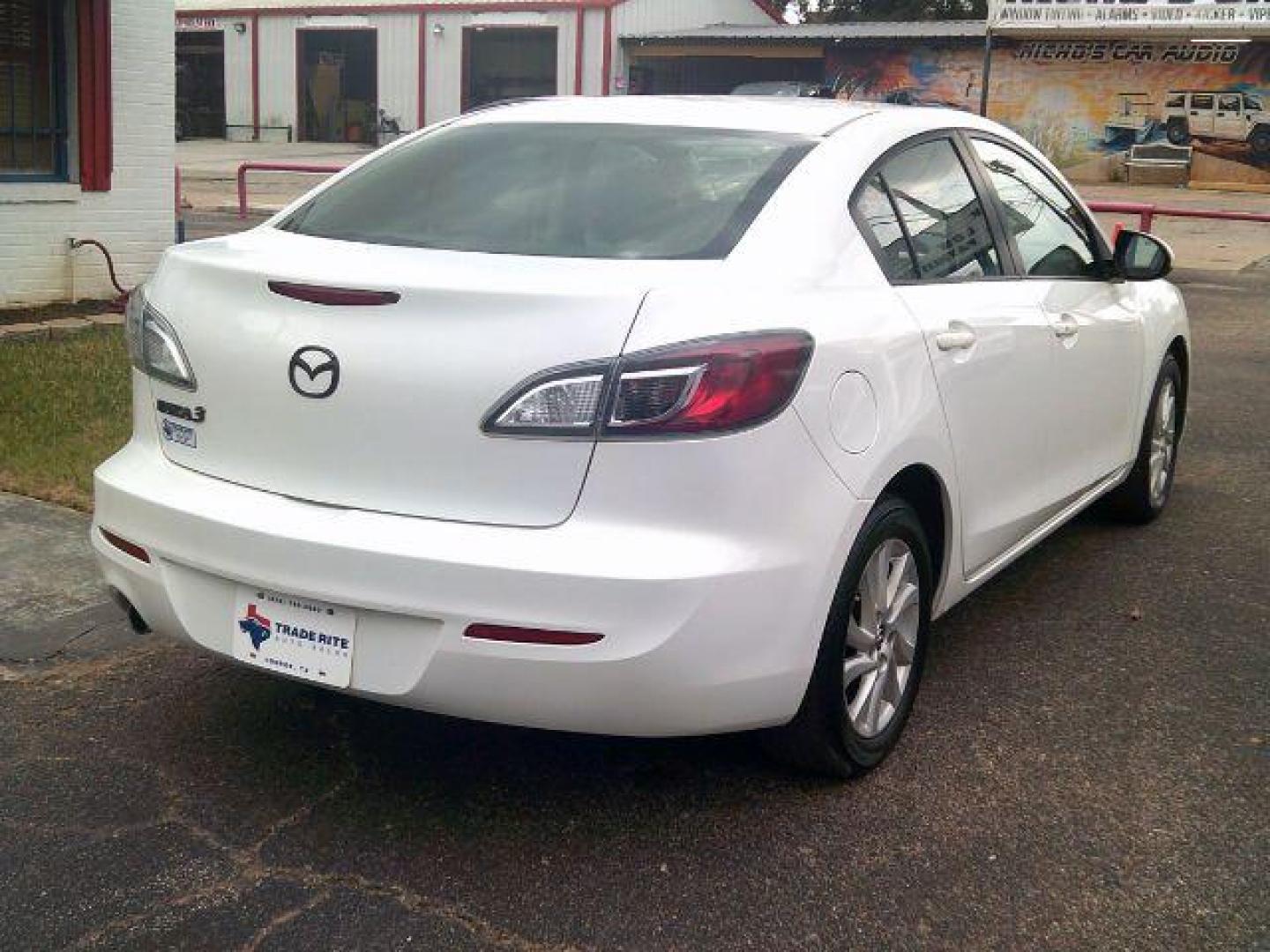 2013 Crystal White Pearl Mica /Dune Mazda Mazda3 i Touring (JM1BL1VP6D1) with an SKYACTIV-G 2L I-4 gasoline direct injection engine, 5-Speed Automatic transmission, located at 116 N. Frazier Street, Conroe, TX, 77301, (936) 647-0690, 30.308662, -95.460480 - Photo#5