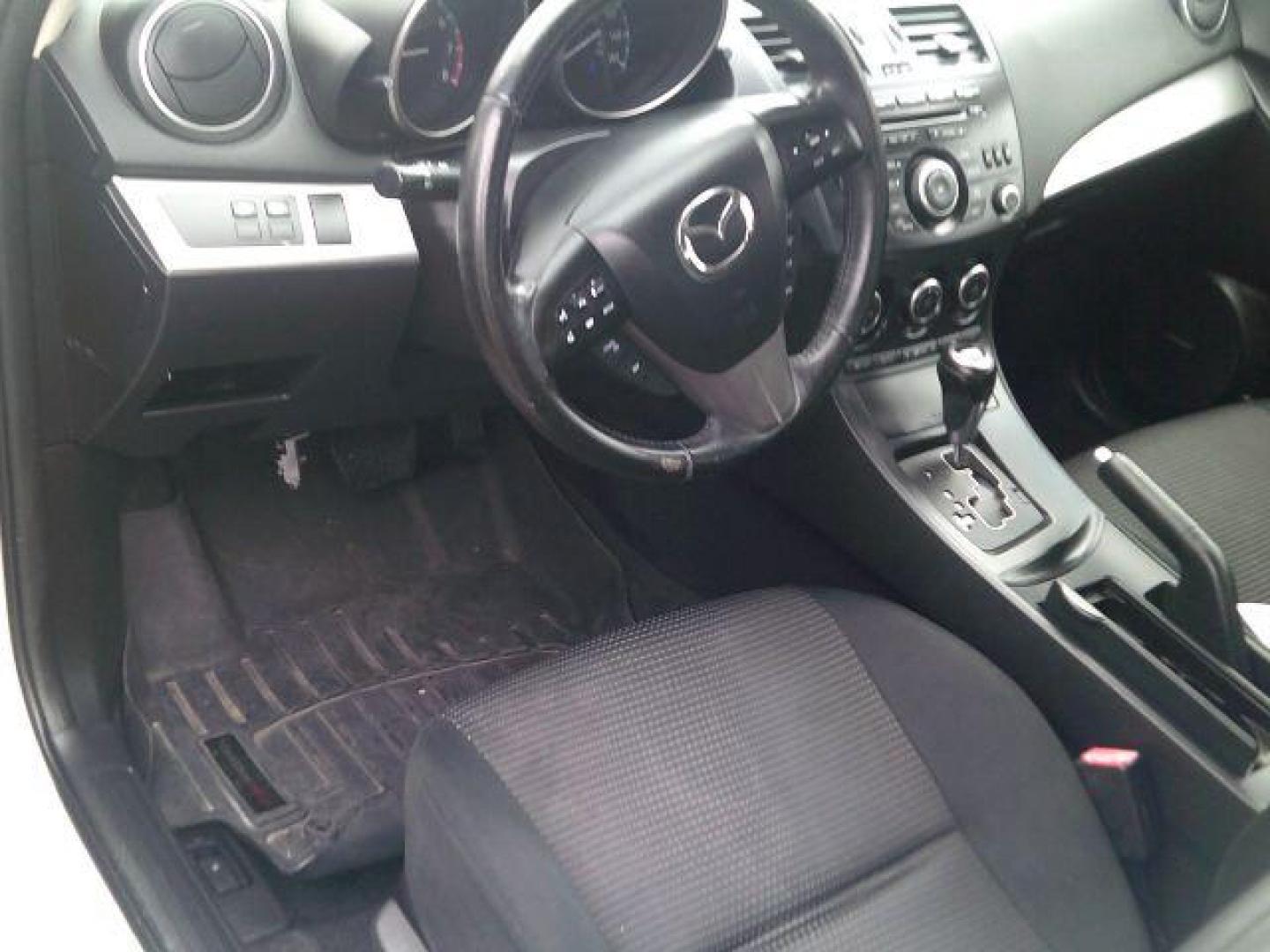 2013 Crystal White Pearl Mica /Dune Mazda Mazda3 i Touring (JM1BL1VP6D1) with an SKYACTIV-G 2L I-4 gasoline direct injection engine, 5-Speed Automatic transmission, located at 116 N. Frazier Street, Conroe, TX, 77301, (936) 647-0690, 30.308662, -95.460480 - Photo#7