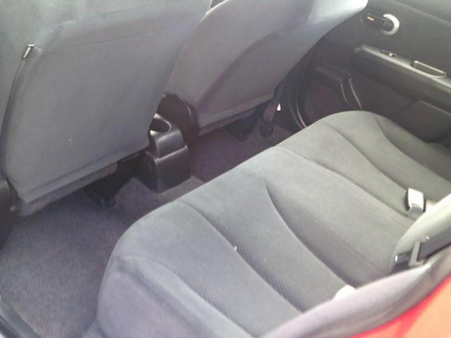 2012 Red Alert Metallic /Charcoal Nissan Versa 1.8 S (3N1BC1CP8CL) with an 1.8L I-4 DOHC engine, 5-Speed Automatic transmission, located at 116 N. Frazier Street, Conroe, TX, 77301, (936) 647-0690, 30.308662, -95.460480 - Photo#6